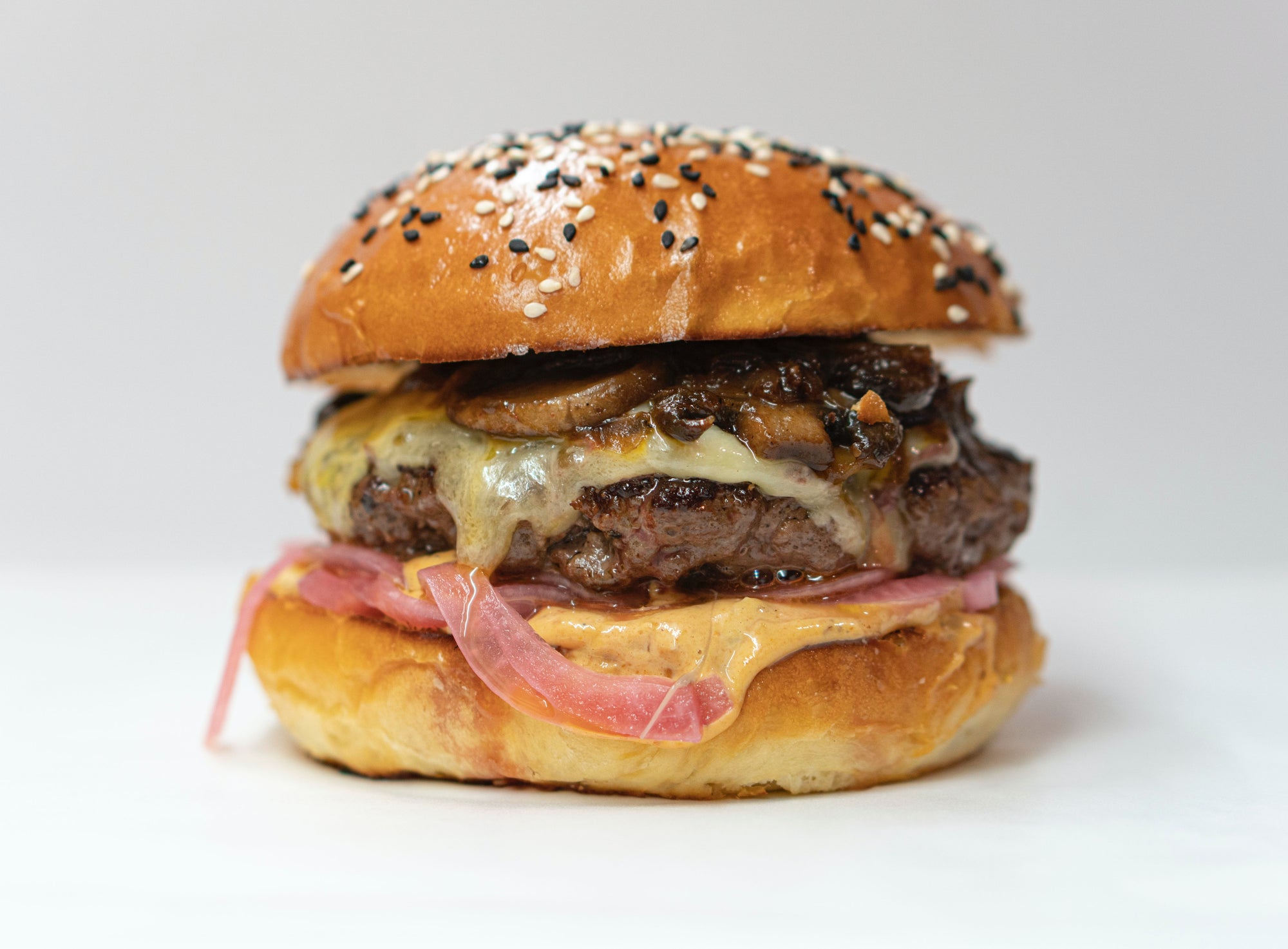Indulge in the Heavenly Japanese Wagyu Burger with Creamy Uni Sauce - A Gourmet Delight