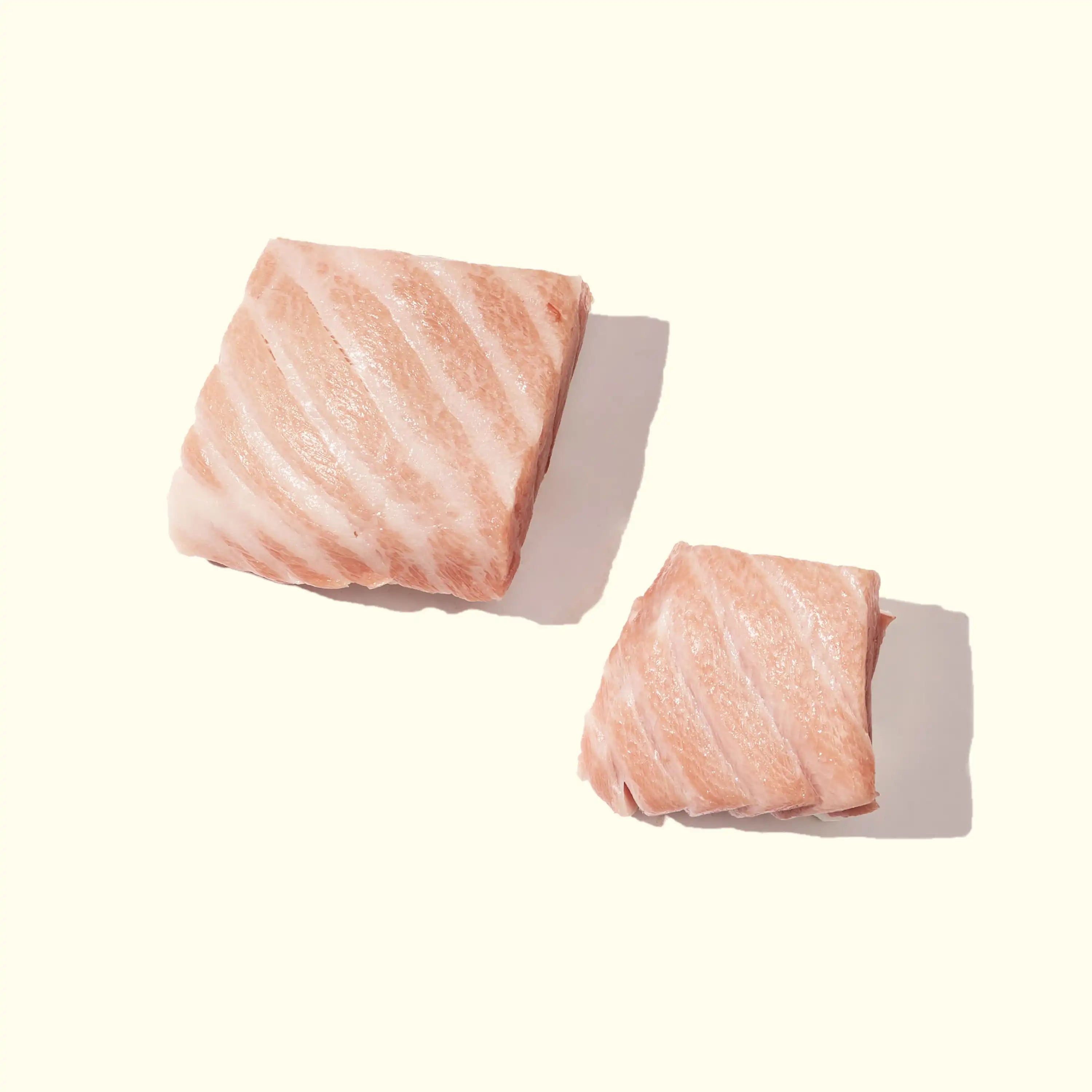 Bluefin Tuna Otoro 4oz vs 7oz size comparison of saku blocks thawed color fatty pacific sustainable - order fresh seafood online sushi sashimi riviera seafood club