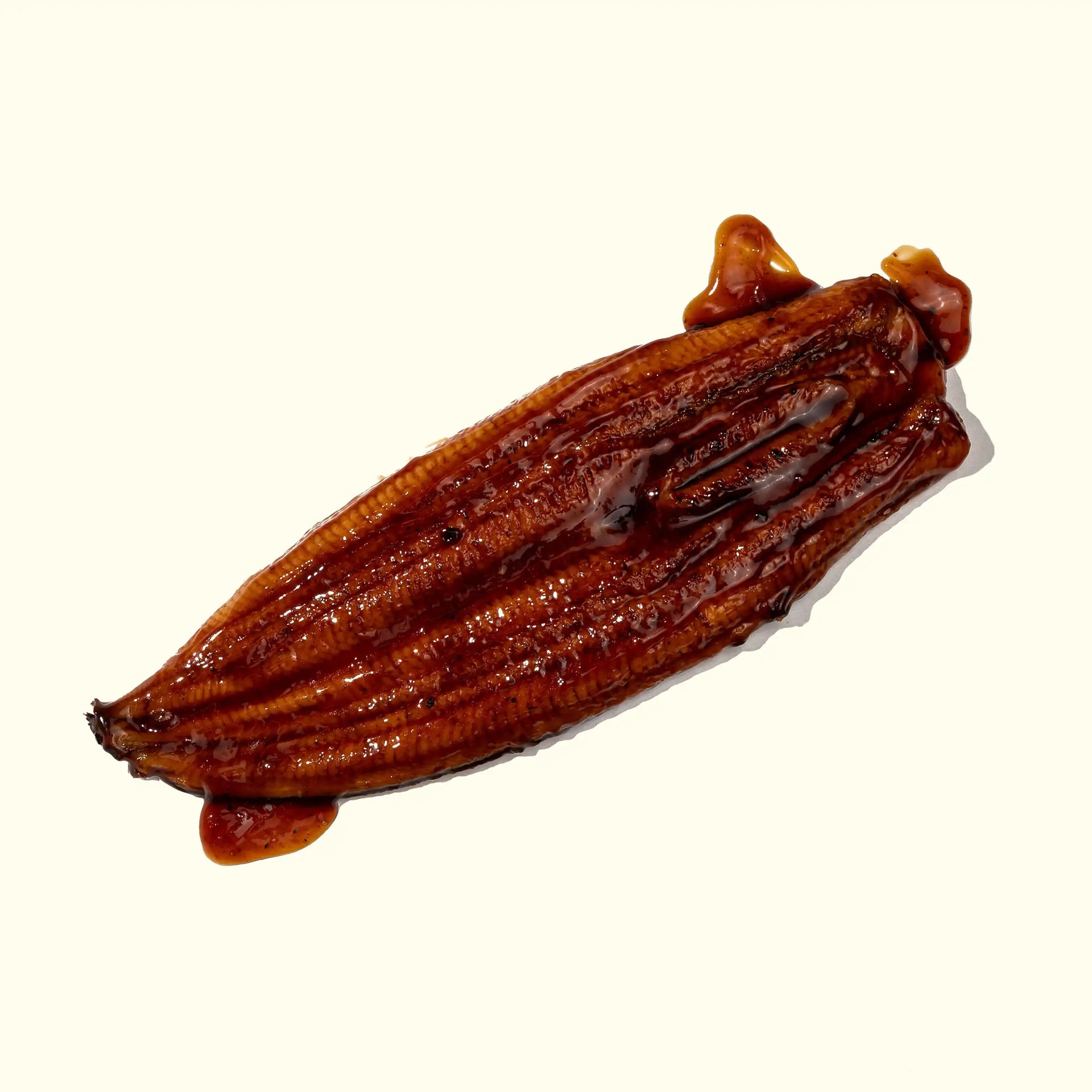 Kabayaki Unagi (BBQ Eel Sushi) - overhead photo of fliet showing glazed texture - order fresh seafood online home delivery sushi sashimi grade riviera seafood club